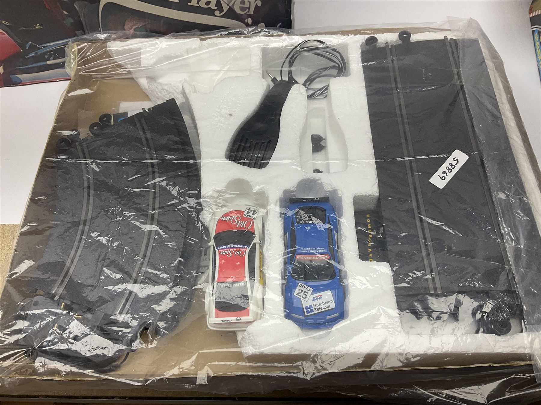 Scalextric - Scalextric 400 C587 set with March Ford 721 and JPS Formula One cars; Calibra Cup set with Motorsport Calibra and Old Spice Calibra; C8040 Track Extension Pack, Hump Back Bridge part-set and unassociated SuperSlot 1:32 scale die-cast Williams-Toyota FW29 unassembled car in four blister packs 