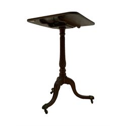 Regency mahogany tripod wine table, the moulded rectangular tilt-top on twist column, three splayed moulded supports, ornate brass moulded cups and castors