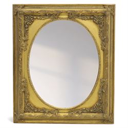 20th century gilt and composition framed wall mirrors, comprising a Rococo revival rectangular mirror with pierced scrolling acanthus and C-scroll cast border enclosing a plain plate (H 65cm, W 40cm), an oval neoclassical mirror with beaded frame, laurel crestings and trailing foliate sprays (H 57cm, W 45cm), a rectangular mirror with simulated marble effect side panels and foliate cast outer border (H 60cm, W 75cm), and a rectangular mirror with reeded and foliate moulded frame surrounding an oval aperture and plain plate (H 86cm, W 56cm)