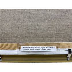 Dag Hagenaes Kjelldahl (Norwegian/Whitby Contemporary): 'Grosmont Railway Station at Night in Red with Clock', oil on canvas signed and dated 2004, 30cm x 40cm