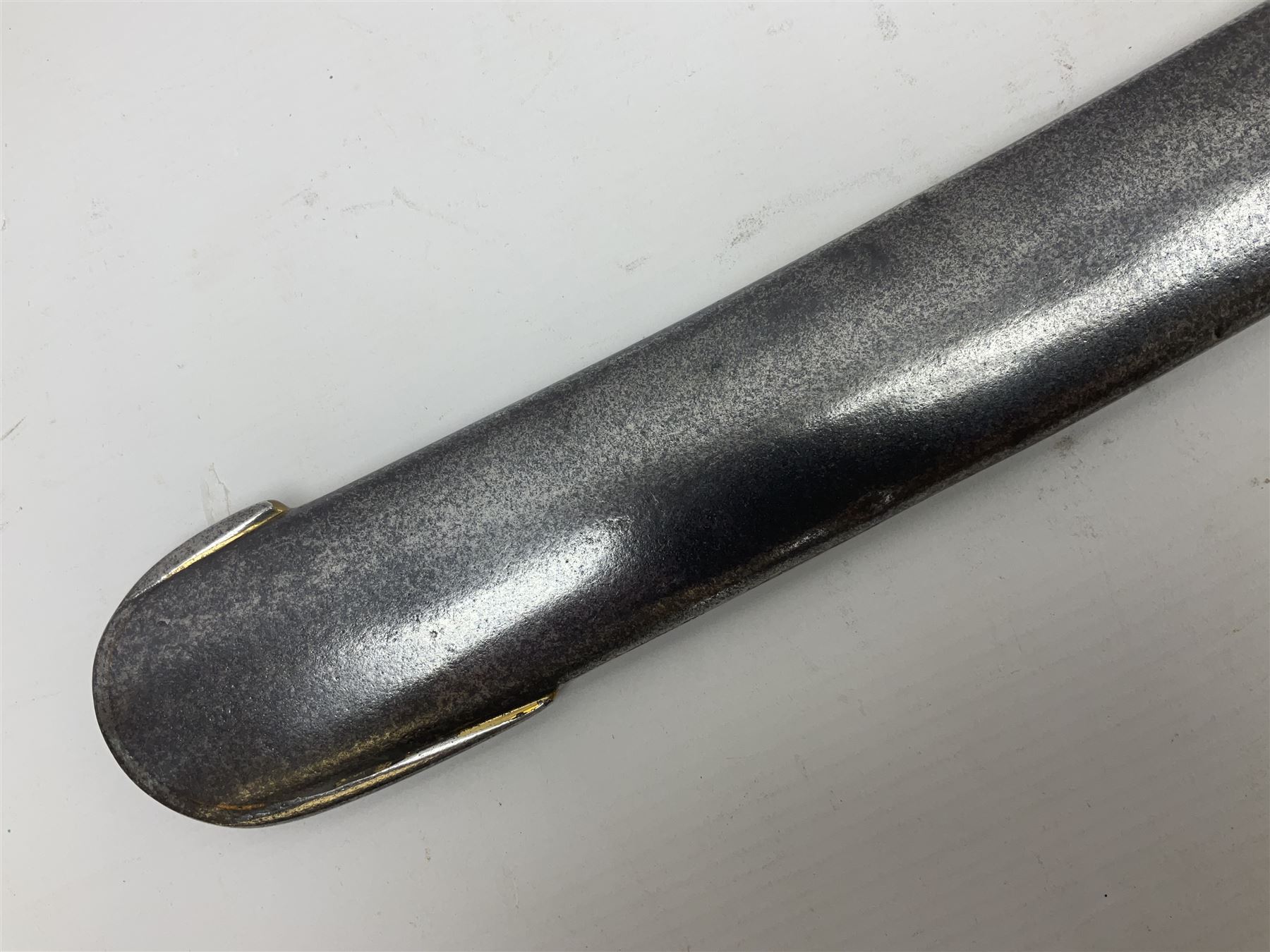 British 1796 Pattern Light Cavalry trooper's sword, the 84cm curving fullered blade stamped Hadley.1 to the back edge, steel hilt with knucklebow, D-shaped langets and leather grip; in polished steel scabbard stamped Osborn & Gunby Birmm. and W.R.16 ( ?16th Light Dragoons) with two suspension rings L100cm overall