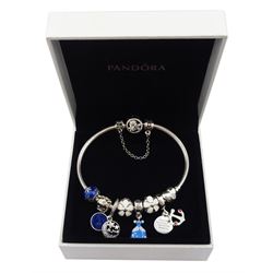 Pandora Moments flower clasp silver bracelet with Disney Cinderella charm, seven other Pandora charms, and flower safety chain, boxed