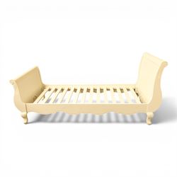 Modern white painted single sleigh bed frame and mattress, with scrolled head and footboard with foliage detail