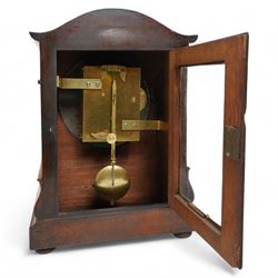 Brooks of London- Regency 8-day rosewood bracket clock c1825, with a serpentine shaped pediment and foliate carving on an ogee stepped base with bun feet, 8