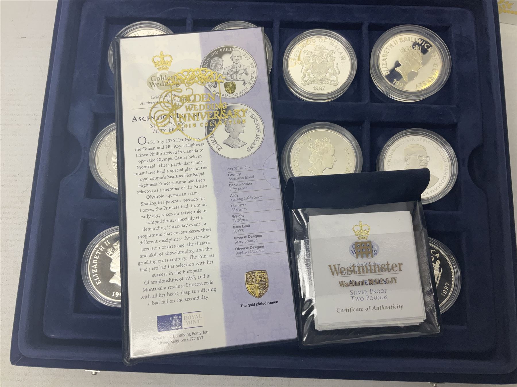 The Royal Mint Golden Wedding Anniversary silver proof coin collection, comprising twenty-four international commemorative coins, cased with certificates