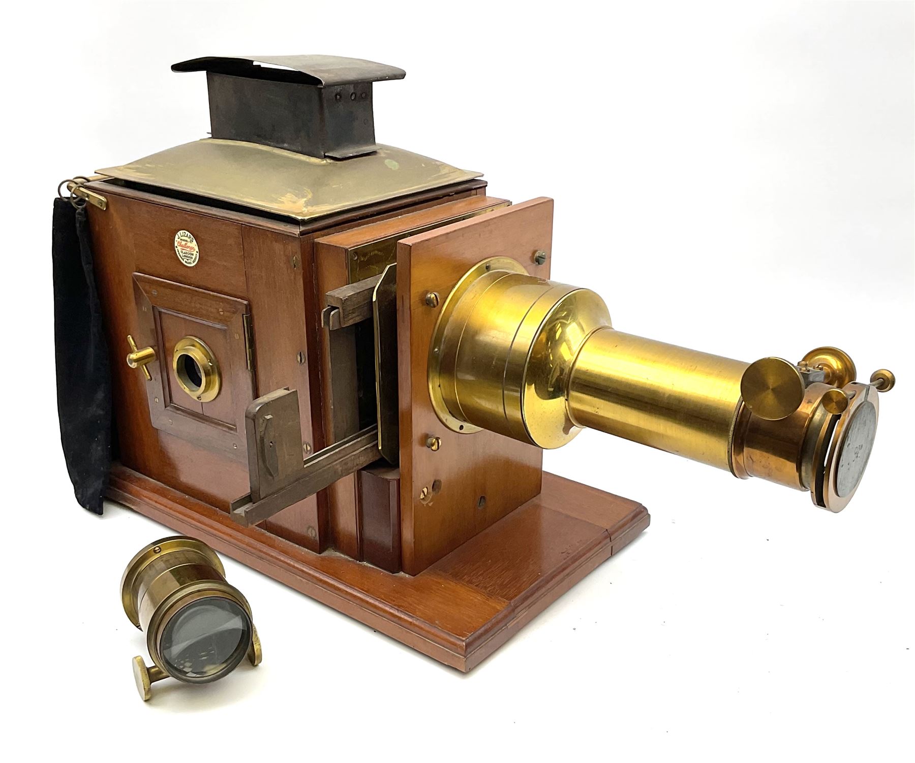 Victorian brass and mahogany 'Model C Challenge' magic lantern projector by J. Lizars, with long and short lenses, bears inset maker's plaque, L50cm excluding lenses (lacking burner)