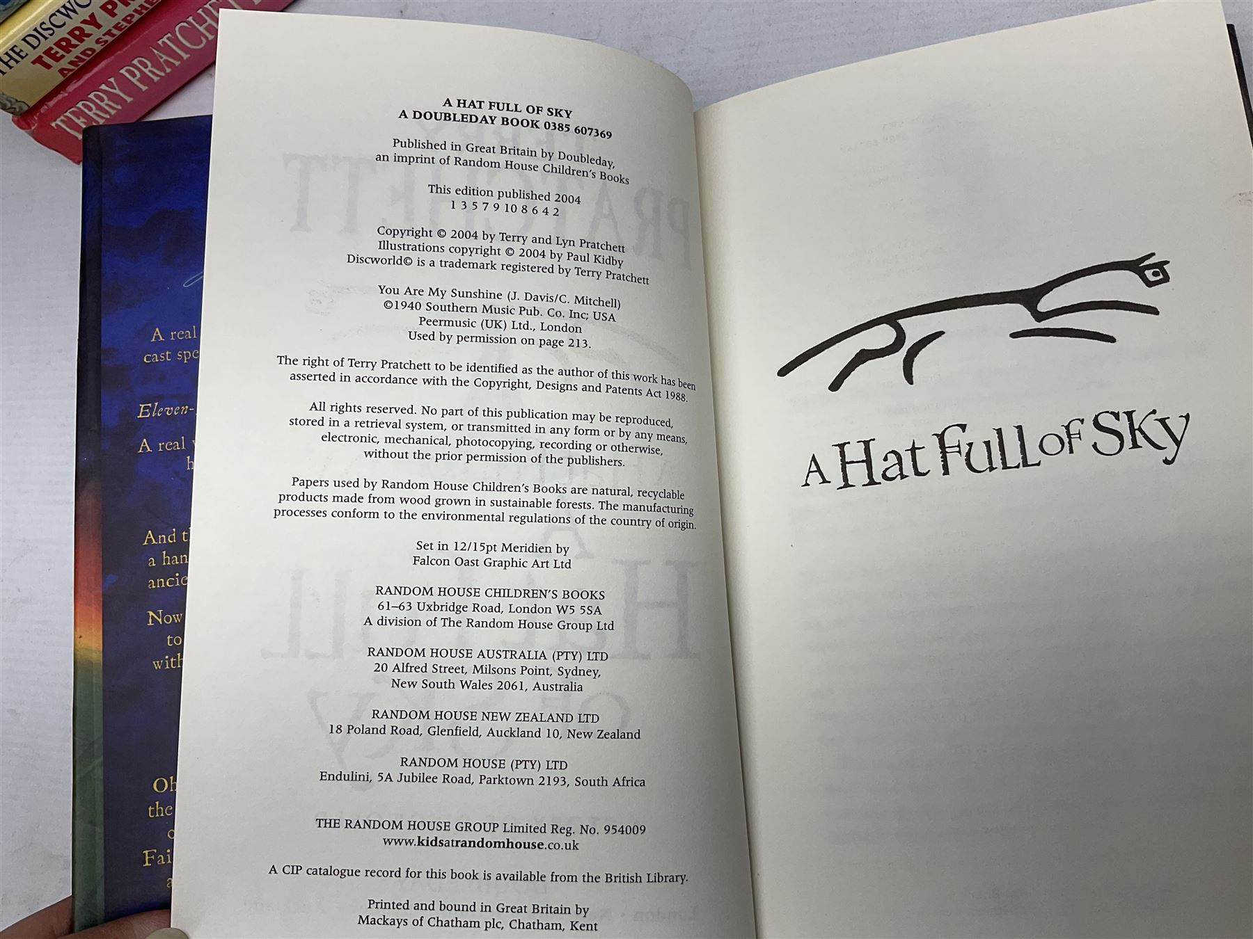 Collection of twenty-three hardback Terry Pratchett books, comprising approximately eighteen first editions including The Fifth Elephant signed & inscribed by Pratchett, all with dustjackets