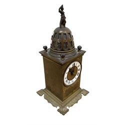 Tiffany- early 20th century brass cased 8-day mantle clock, rectangular case with engraved images taken from classical & mythological fables, with an open strapwork dome, finials to the corners and a cast figure of a standing maiden, case raised on a splayed base with acanthus engraving, enamel dial with Roman numerals, minute markers and steel hands, dial centre engraved Tiffany & Co Paris, twin train French movement with a platform escapement wound from the rear, baseplate of case stamped with the serial numbers 4372 & 5652. With key. 
Provenance from Chatsworth House, Derbyshire.