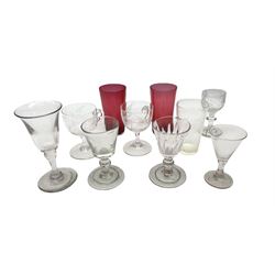 Four 18th century drinking glasses, to include example with bucket bow, knopped stem and folded foot, and another with part fluted bowl, knopped stem and folded foot, together with six Victorian and Edwardian drinking glasses of various form, including pair of Victorian cranberry glass beakers, (10)