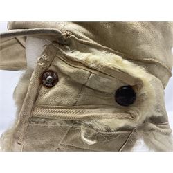 WW2 German Luftwaffe winter or Eastern Front fur cap with fold-down ear covers; cloth eagle and roundel insignias; bears label numbered 82920 with other indistinct markings