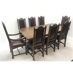  Old Charm oak drawer leaf dining table, carved cup and cover supports on shaped sledge feet joined by single stretcher (W275cm extended, 183cm closed, H76cm, D108cm) and set eight (6+2)  chairs, arched cresting rail with finials, studded leather back and seat, cup and cover supports joined by stretchers (W  