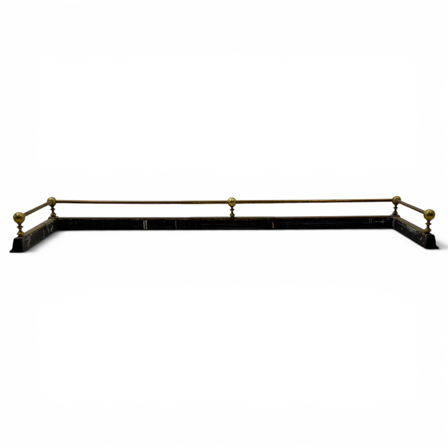 Three 20th century brass fenders, two with pierced Art & Crafts design rails, largest W156cm, D 45cm 