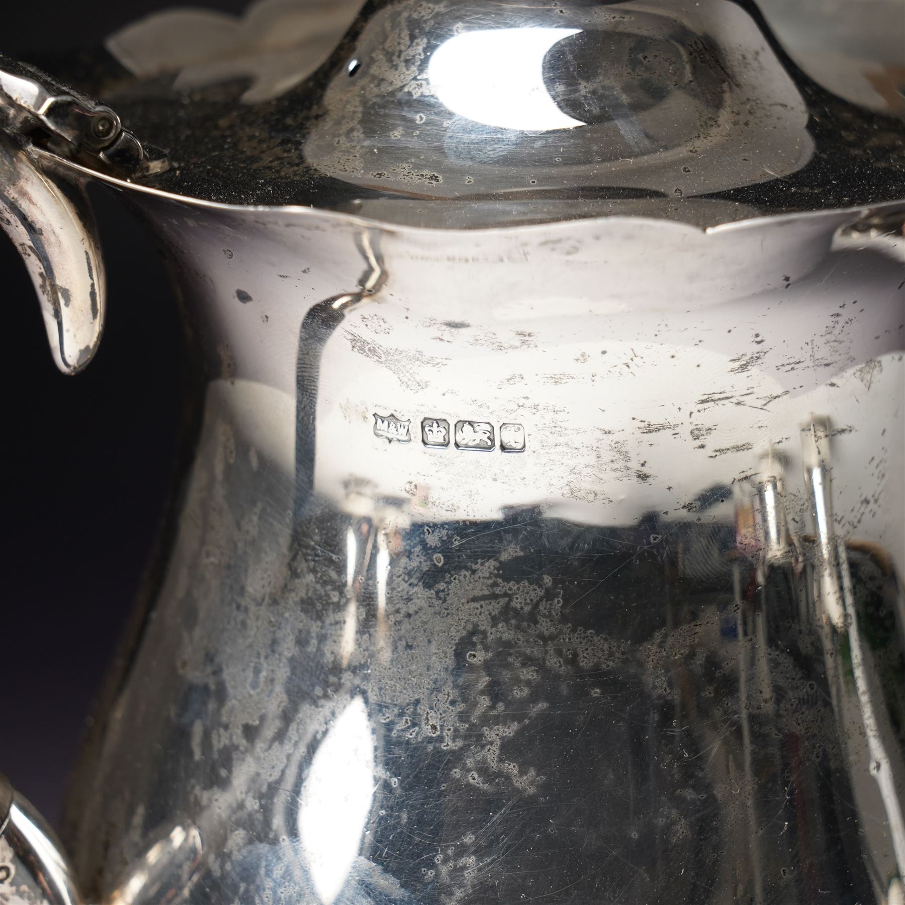 Silver matched five piece tea and coffee set of baluster form engraved with a monogram on shaped supports Sheffield 1913, the teapot 1911, the coffee pot 1924 Maker Mappin & Webb