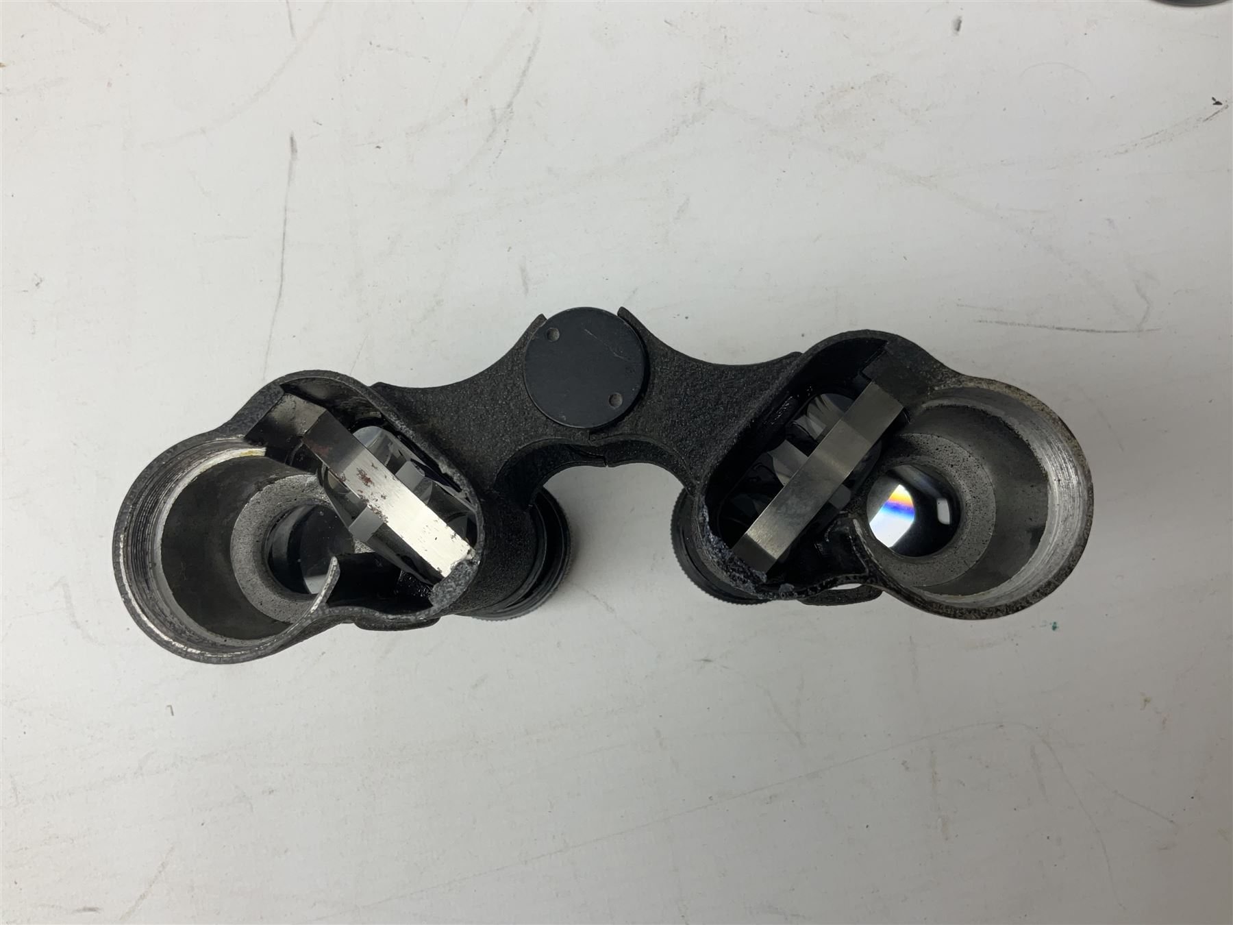 Quantity of binoculars for spares and repair, to include Cogswell & Harrison Primic 8x30, Prinz 8x30, Telstar 35x60, Zeiss Wetzland 8x40 etc