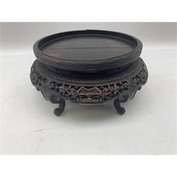 Early 20th century Chinese cloisonne bowl, of squat circular form, the interior decorated with a five clawed dragon chasing a flaming pearl, the exterior with conforming decoration, with character mark beneath, rim D16cm, with carved wooden stand