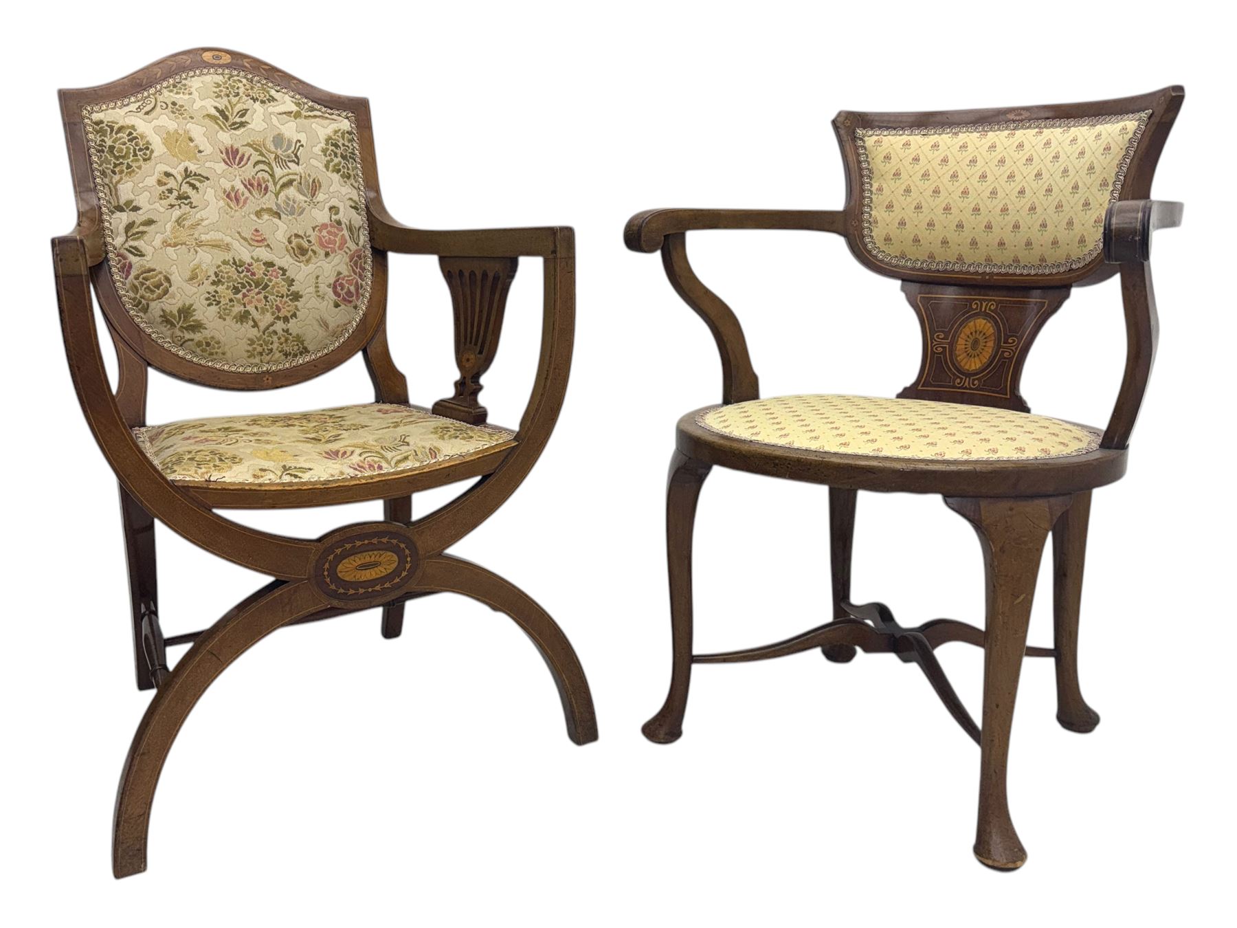 Edwardian inlaid mahogany X-frame armchair, upholstered seat and shield-back, curved front supports united by turned H-stretcher (W57cm, D58cm, H94cm); similar inlaid mahogany armchair, raised on cabriole supports united by cross-stretcher (W62cm, D60cm, H82cm) 