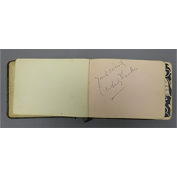  Early 20th century autograph album containing signatures and ink drawings including Houdini signed as Harry Handcuff Houdini using the same 'H' for each word, dated Bradford Yorkshire Jan 17 - 1920 7.45pm, Charlie Chaplin on laid-in fragment of paper, Enid Bennett, Gregory Scott, Milton Hayes etc, disbound  
