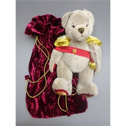  Hermann limited edition teddy bear designed by Sarah Faberge No.98 with grey plush body, applied eyes and stitched features, wearing Imperial red sash and gold epaulettes H39cm in red velvet draw-string bag  