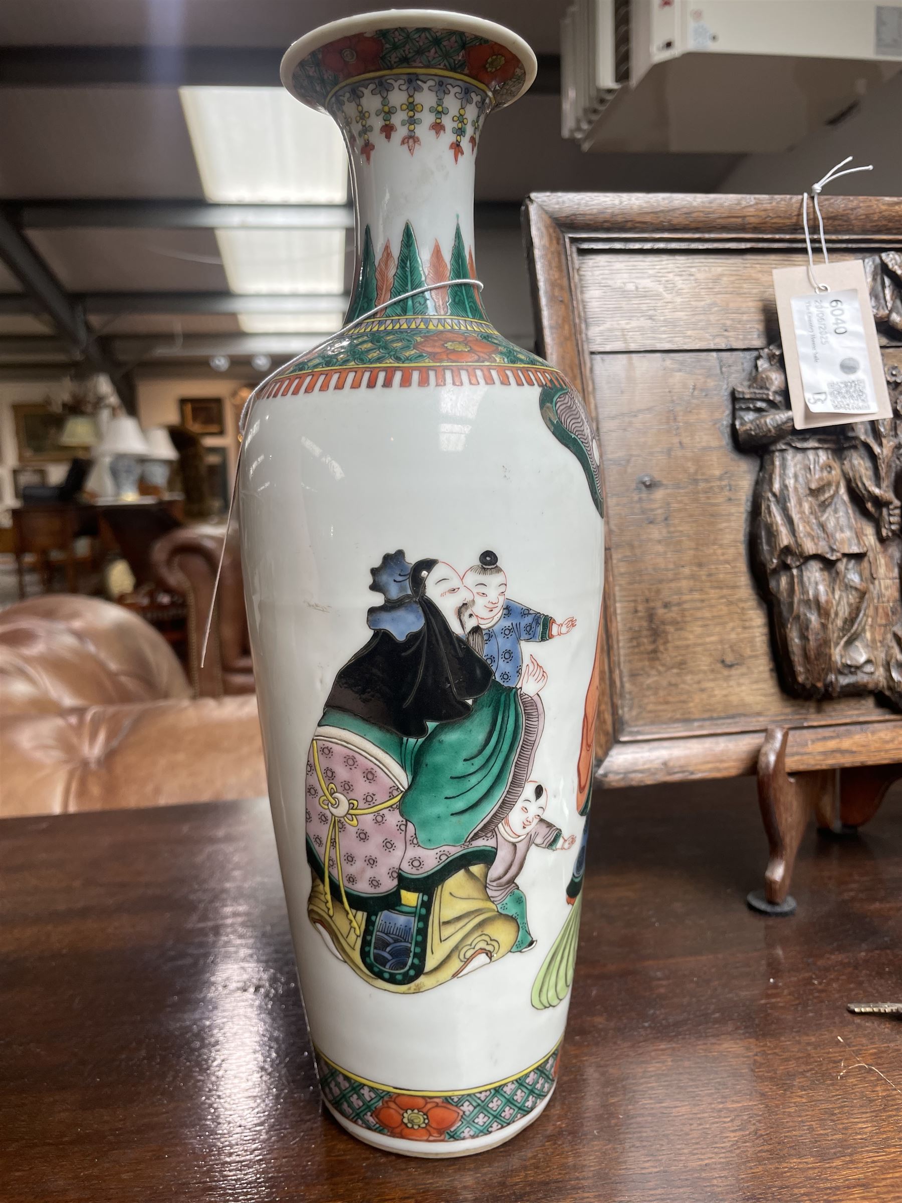 Chinese Kangxi famille verte vase of baluster form with fluted rim, decorated with sage and attendants within a trellis border, with four character Kangxi double ring mark beneath, H31cm 