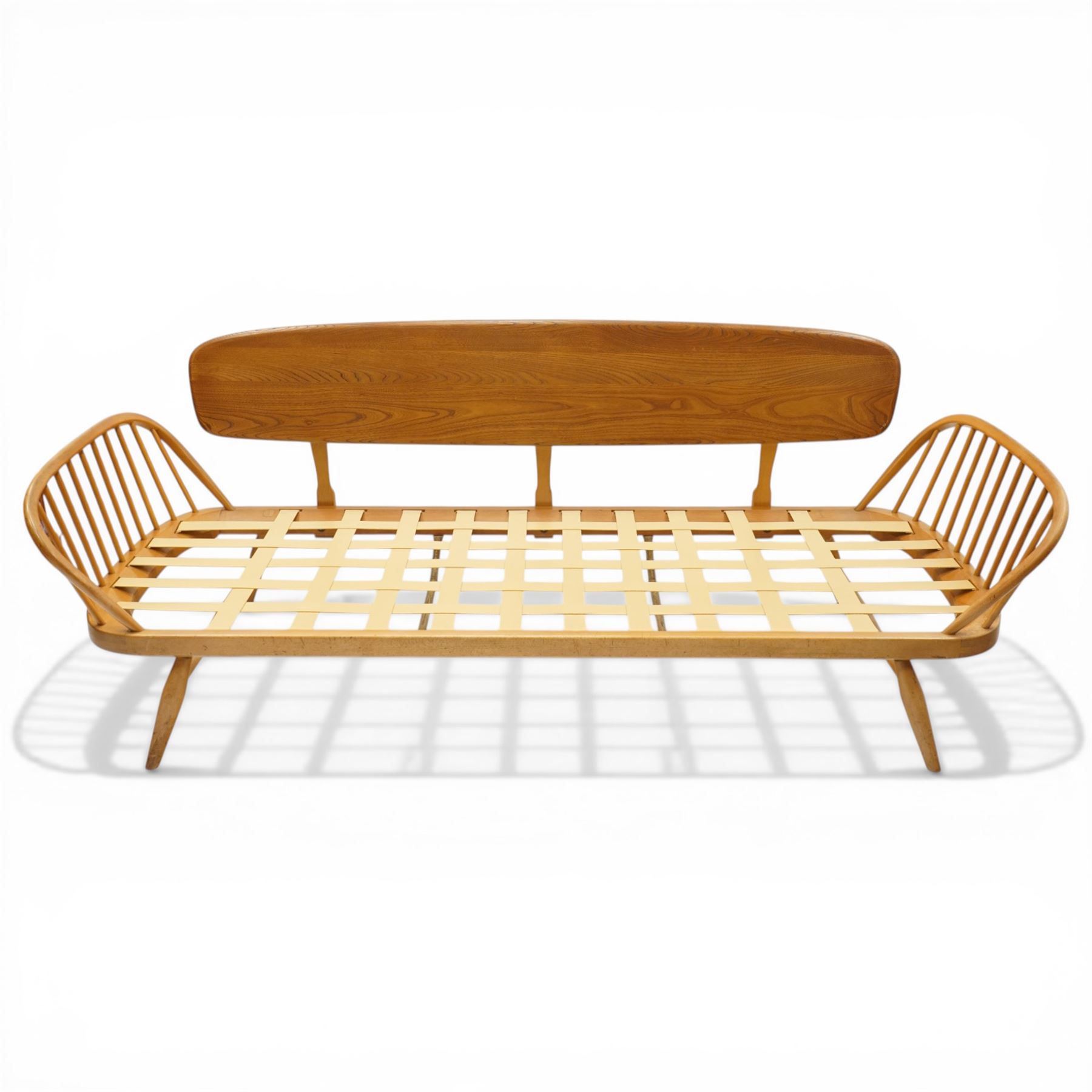 Lucian Ercolani for Ercol - 'Studio Couch' model no. 355, elm and beech framed, with loose tufted pink cushions