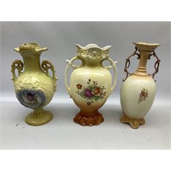 Baluster form vase decorated with blossoming branches and butterflies upon plain ground, Arthur Wood Imari jug, together with two twin handled vases decorated with floral central panels etc