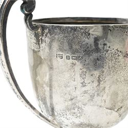 Silver trophy, small silver toast rack and a silver napkin ring