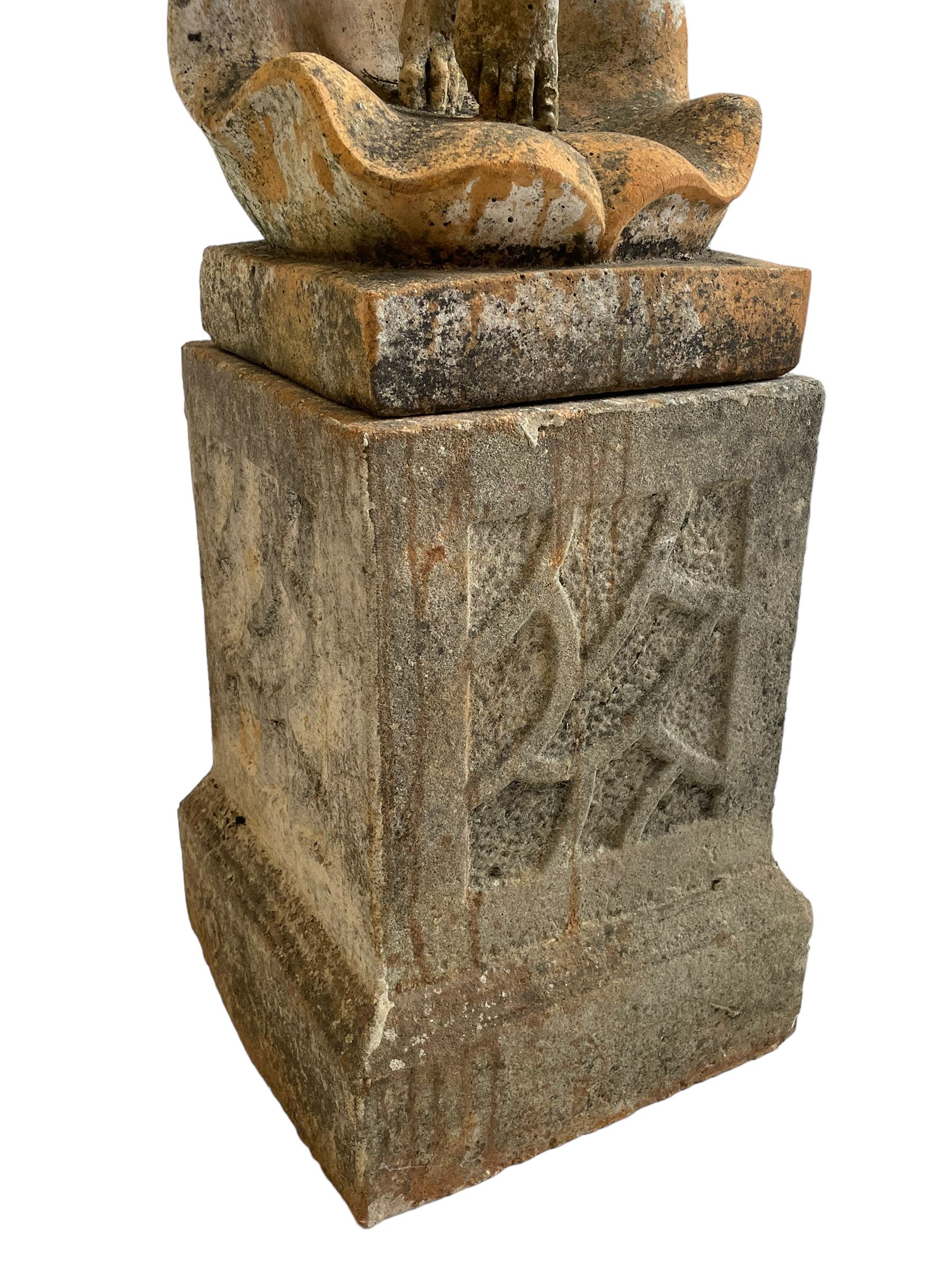 Cast stone two-piece garden figure of the Birth of Venus, depicting the goddess emerging from a stylised shell, on square base with stepped moulded plinth 