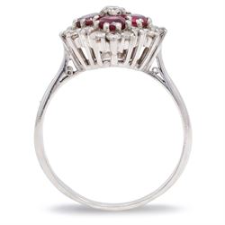 18ct white gold ruby and diamond cluster ring, set with round round cut rubies and seventeen round brilliant cut diamonds, total ruby weight approx 1.15 carat, total diamond weight approx 0.55 carat