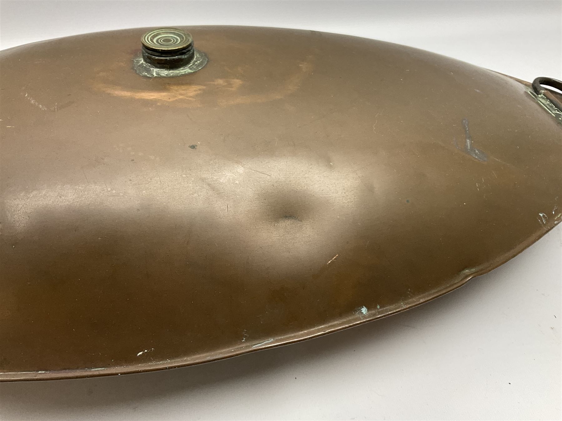 Victorian copper carriage foot warmer of flattened oval form with two carrying handles, L70cm