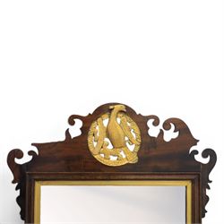 Late 19th century Chippendale style mahogany wall mirror, featuring gilded eagle pediment; together with a smaller similar mirror
