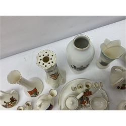 Collection of crested ware, including vases, hat pin stand, miniature teapot etc 