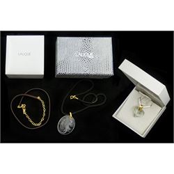 Lalique jewellery including clear crystal heart pendant, Naiade crystal pendant and a rubber choker necklace, all boxed