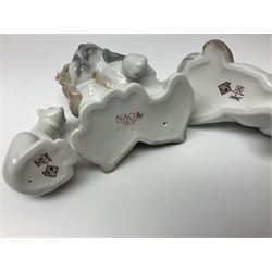 Ten Nao figures, to include three Cheeky Cherubs, Cat, Dog bride and groom etc