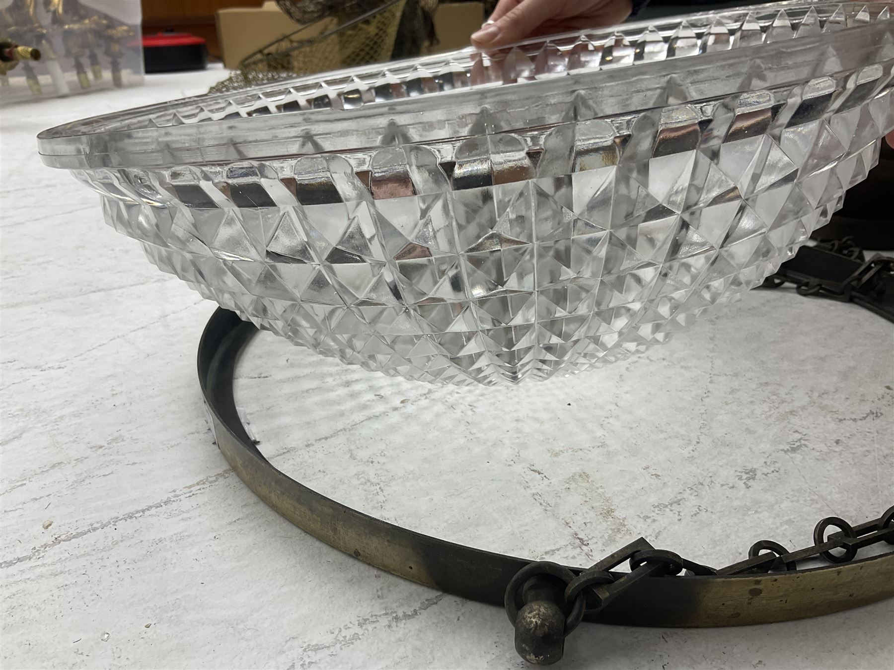 Edwardian glass holophane ceiling light, the domed bowl shade suspended in circular brass frame by three chains, stamped Crystal Bowl Holophane 8424, patent no 1796, 1910 on the inside rim, D35cm