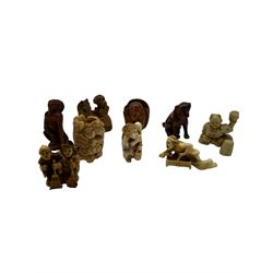 Nine wooden and composite carved netsukes, to include dog, horse and monkey, female figure etc 