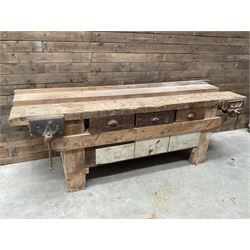 Large vintage work bench, fitted with six drawers and two vice