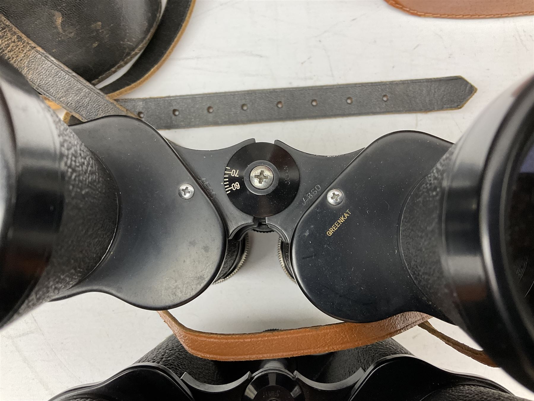 Nine cased pairs of binoculars, to include Tohyoh 22x70, Greenkat 7x- 12x50, Chinon, Fisher-Dietz 7x50, etc