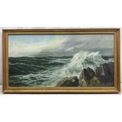 Edgar Freyberg (German 1927-2017): 'Surf' Waves Breaking on a Crag, oil on canvas signed, titled on label verso 50cm x 100cm