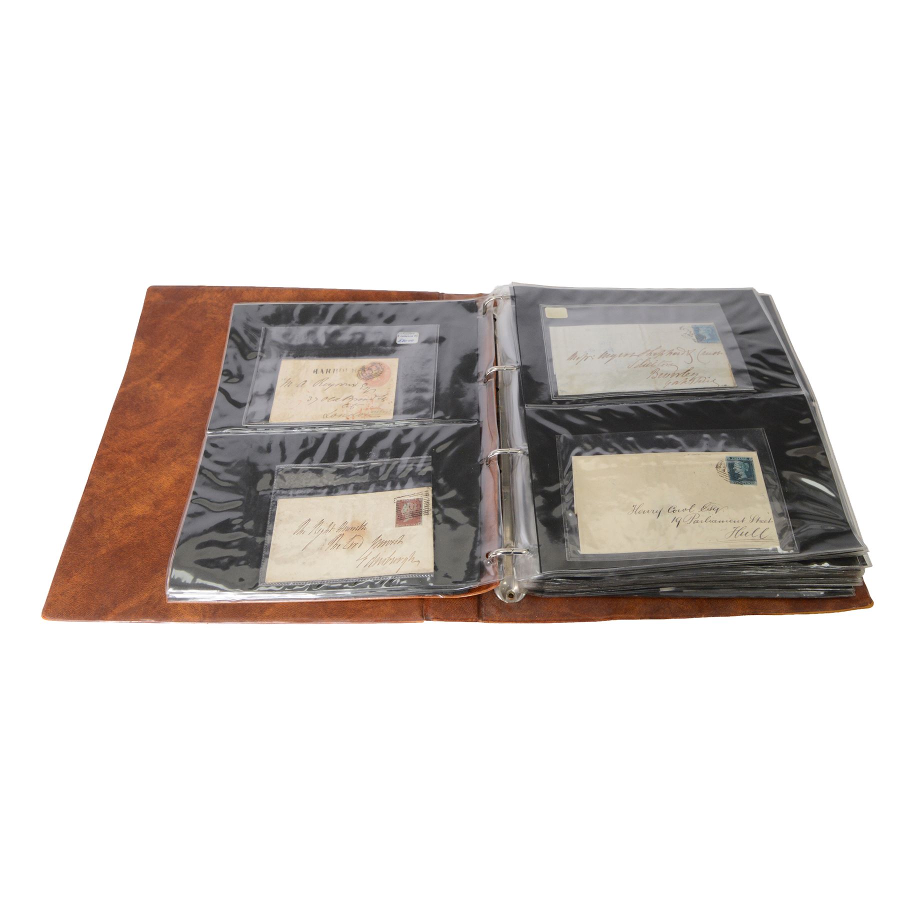 Approximately thirty-seven Great Britain Queen Victoria covers, including penny black with red MX cancel and four margins, two embossed, together with King Edward VII and later covers, in one ring binder folder