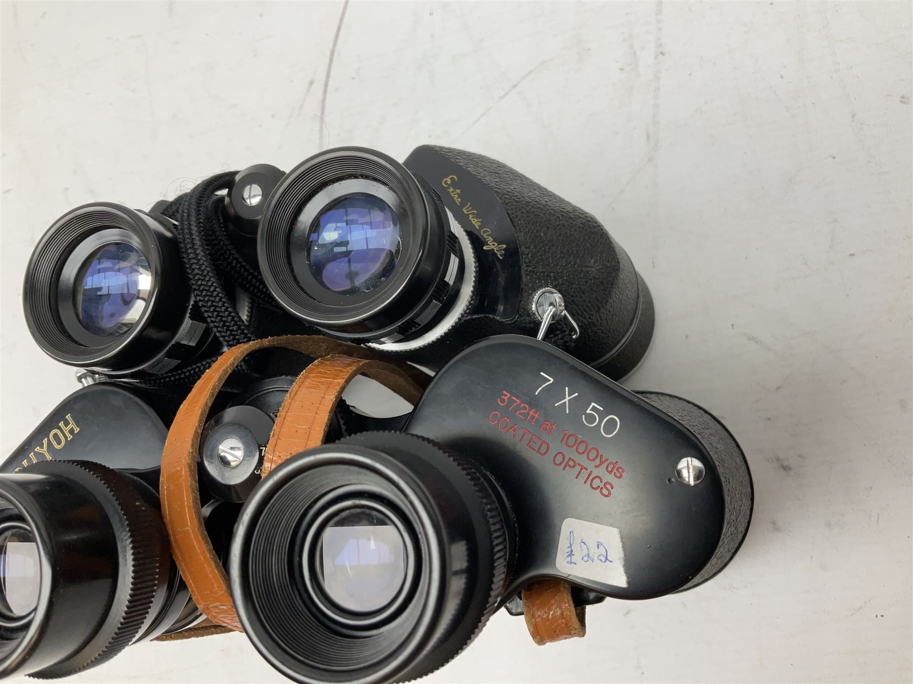 Nine cased pairs of binoculars, to include Tohyoh 22x70, Greenkat 7x- 12x50, Chinon, Fisher-Dietz 7x50, etc