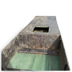 Large early 20th century plank-built wooden river punt, the long tapering hull with enclosed fore and aft decks, open green-painted ribbed interior, together with two paddles