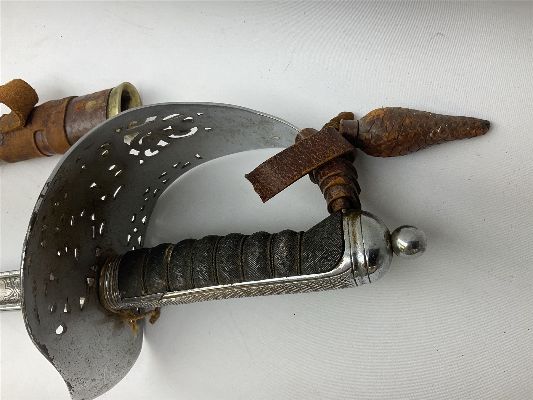 British George V 1897 Pattern Infantry Officers Sword, the 82.5cm fullered steel blade etched and polished with crowned royal arms, GRV cyphers and scrolling foliage, marked Army & Navy Co-operative Society 105 Victoria St London SW to the ricasso,  plated pierced basket hilt with wire bound fish skin grip and leather knot, No.15032; in leather covered scabbard