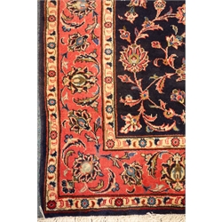  Kashan blue ground rug, floral field, repeating border, 210cm x 140cm  