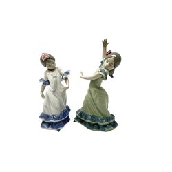 Lladro figure modelled as a female figure playing the flute, Songbird no 6093, together with two further Lladro figures modelled as dancers. 