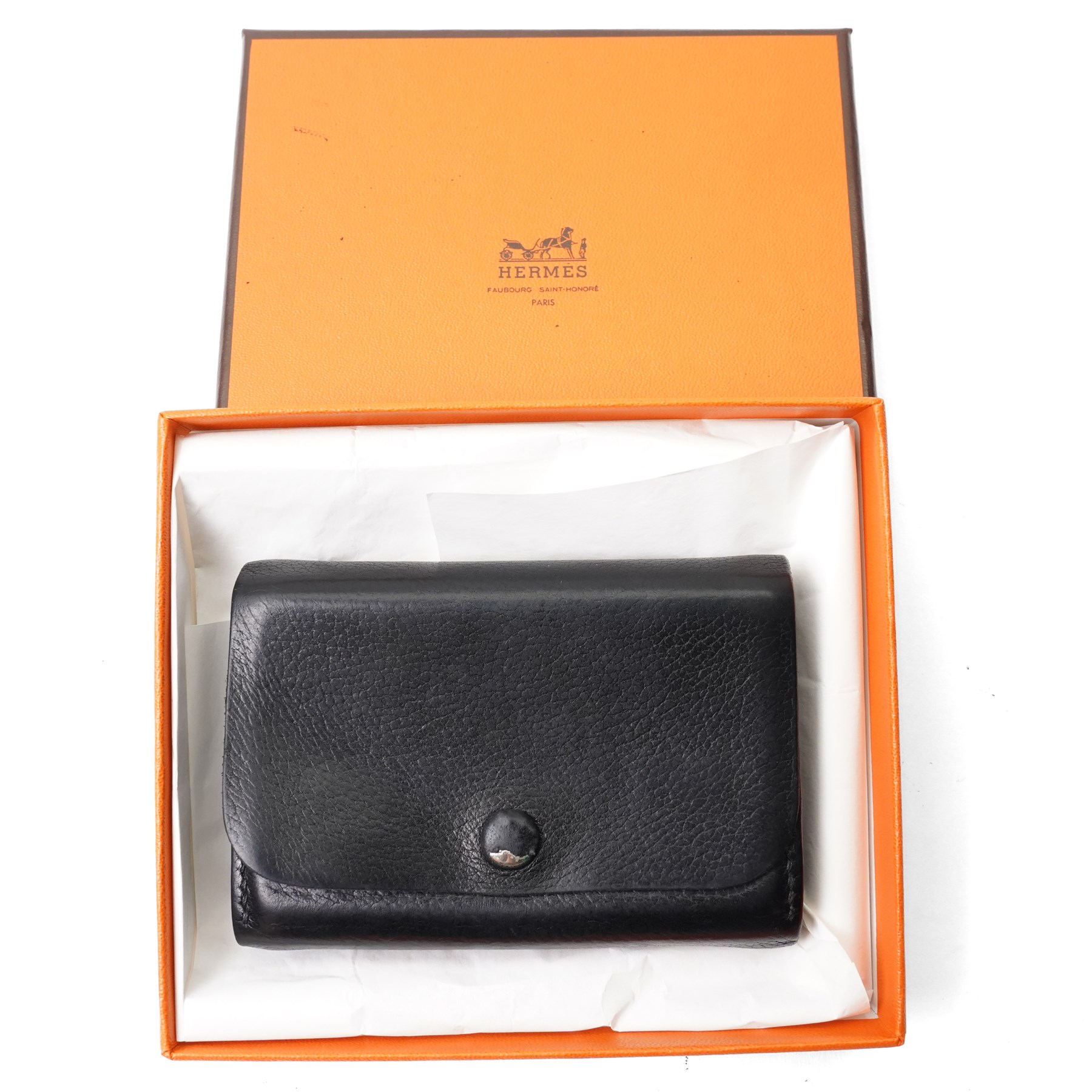 Hermès - black grained leather gusseted card holder, with press-stud fastening and concertina interior, stamped Hermès Paris Made in France, with original box
