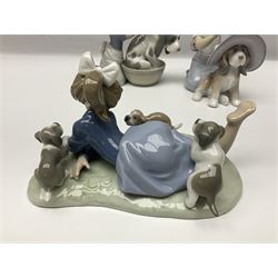 Three Lladro figures, comprising Playful Romp no. 5594, Bashful Bather no. 5455 and Elegant Touch no. 6862, largest H15cm