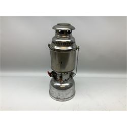 Copper and brass ship’s lamp marked ‘Anchor’, H25cm, Feuer hand storm lantern, Bialaddin Model 315 paraffin lamp and an Anchor lamp (4)