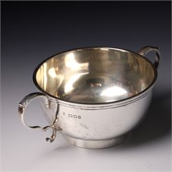 Four piece silver tea and coffee service of baluster form, the tea and coffee pots with domed covers and stained handles London 1916-1918, Maker  C S Harris & Sons Ltd