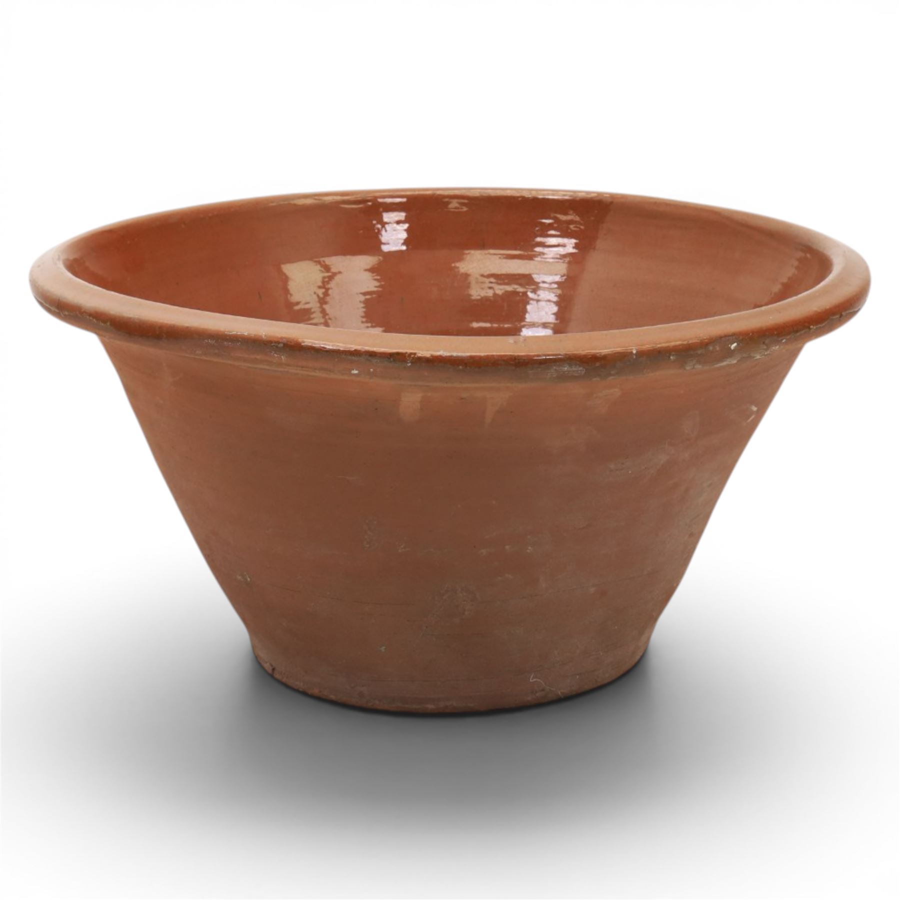 Very large 19th century terracotta pancheon, of typical tapering circular form, with brown slip glazed interior, H30cm D62cm
