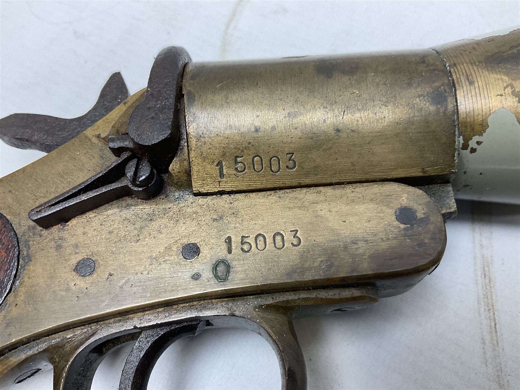 Schermulys Patent No.503324 nitro proof line throwing pistol No.15003; brass body with proof marks; the 32cm steel barrel with secondary handle over and original transfer 'The Schermuly Pistol Rocket Apparatus Ltd. London' L51cm overall
